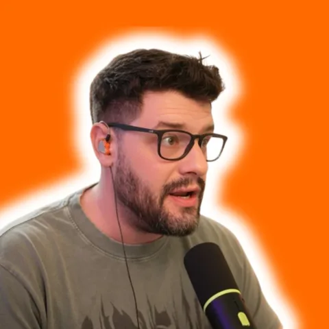 Kevin, host of Kevin Is A Human, at the mic